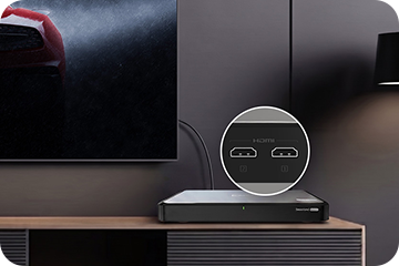 QNAP NAS connected directly via HDMI to a home theater AV receiver and TV